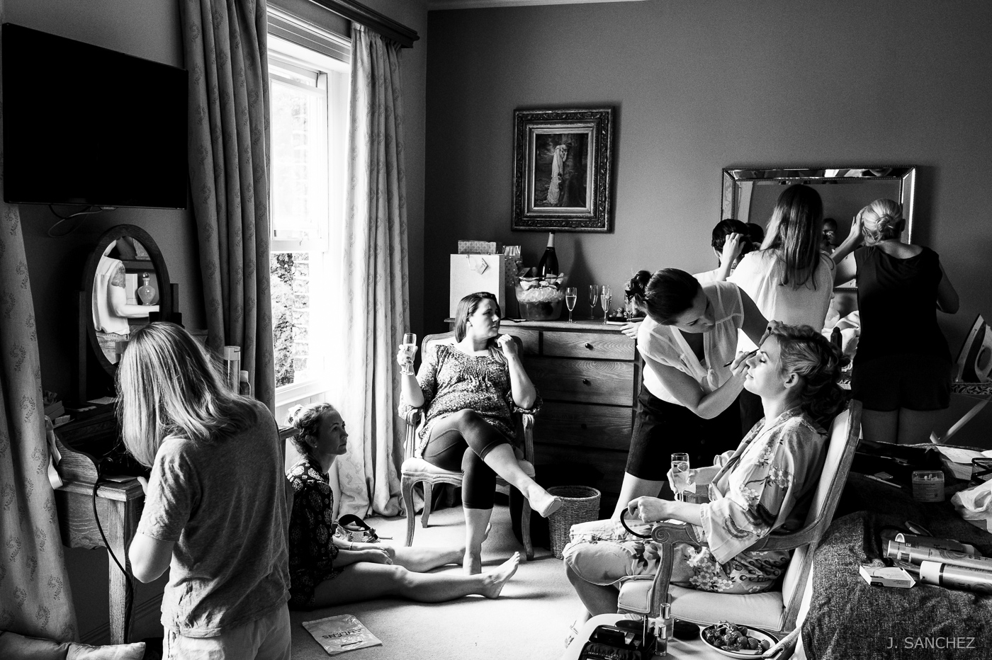 The bride getting ready with bridesmaids and friends